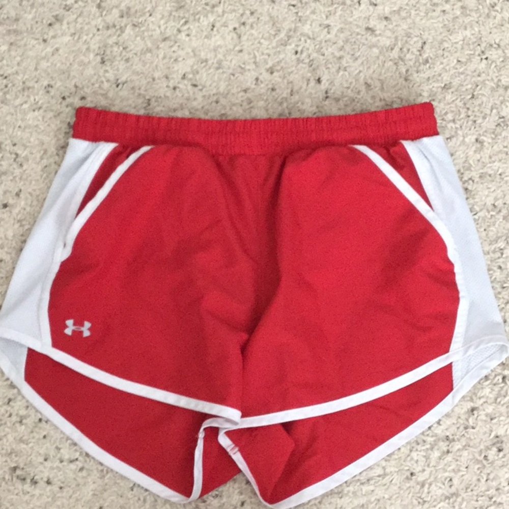 Red and white under armour athletic shorts